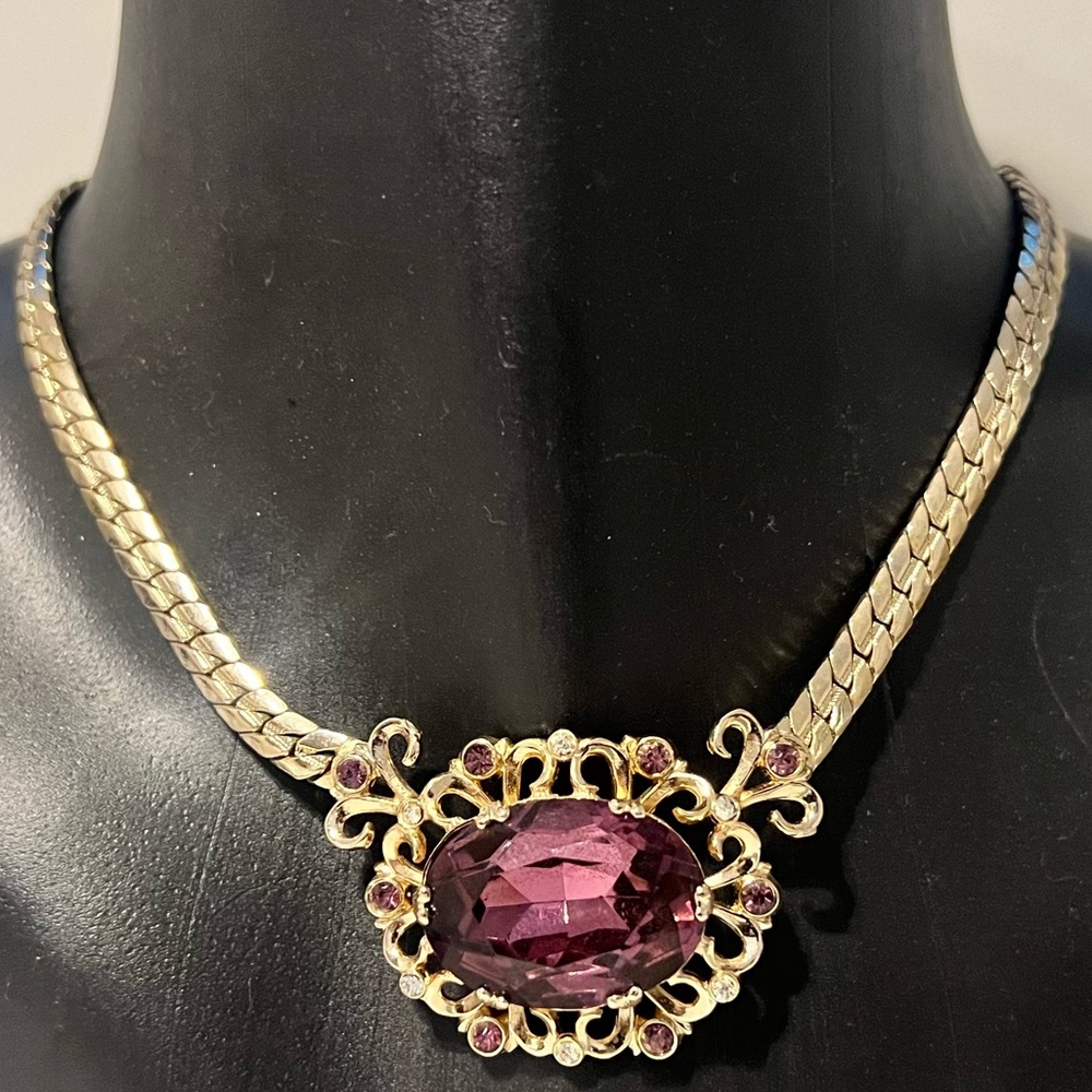 Large Purple Diamond in Gold Setting with White Diamond Studs